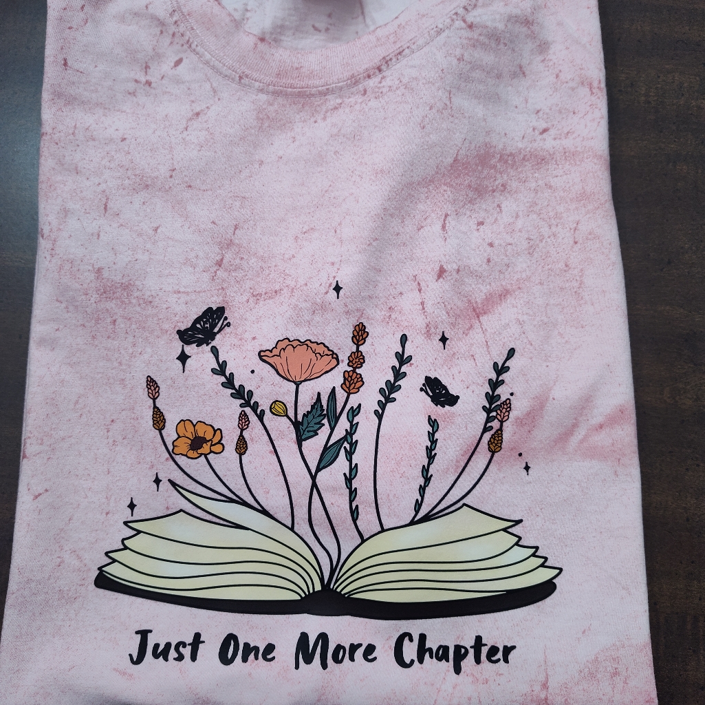 Pink Graphic Tee With Book And Floral Design